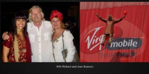 Three people posing beside Virgin Mobile advertisement